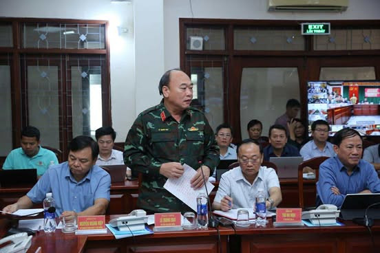 Trung tướng Lê Quang Đạo báo cáo tại cuộc họp (Ảnh: VGP/Minh Khôi)