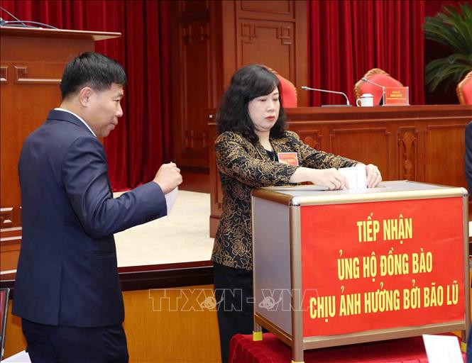 Đại biểu tham dự hội nghị quyên góp ủng hộ đồng bào chịu ảnh hưởng bởi bão lũ lụt (Ảnh: Phương Hoa/TTXVN)
