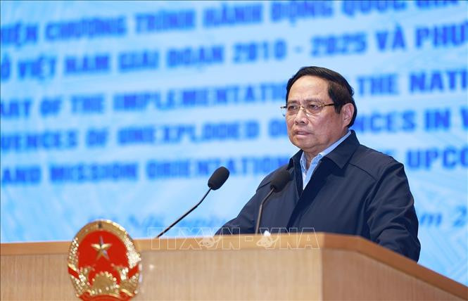Thủ tướng Phạm Minh Chính phát biểu chỉ đạo Hội nghị tổng kết thực hiện Chương trình hành động quốc gia khắc phục hậu quả bom mìn sau chiến tranh ở Việt Nam. Ảnh: Dương Giang/TTXVN