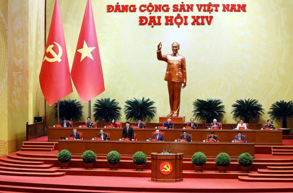 Đoàn chủ tịch Đại hội XIV điều hành phiên thảo luận tại hội trường ngày 21/1 (Ảnh: TTXVN)