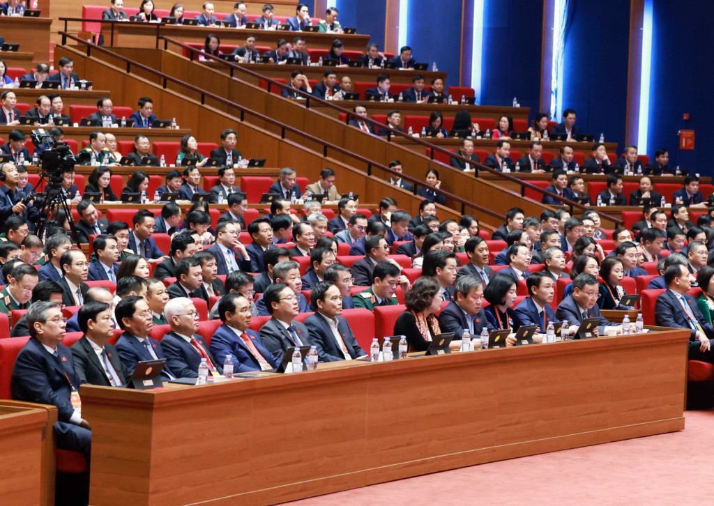 Các đại biểu dự Phiên thảo luận tại hội trường về các văn kiện Đại hội sáng 21/1 (Ảnh: TTXVN)