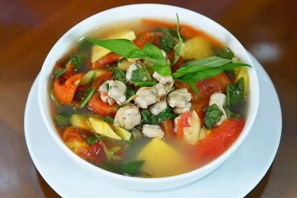 Chọn ngao tươi và sơ chế kỹ là yếu tố quan trọng để có nồi canh chua ngao ngon. (Ảnh: Sưu tầm)
