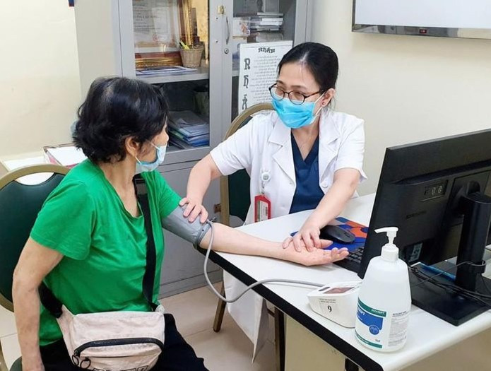 Người dân khám chữa bệnh BHYT tại Bệnh viện Bạch Mai (Ảnh: TL)