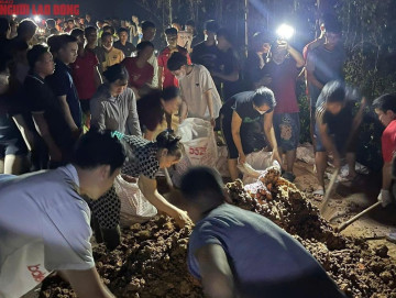 Bắc Ninh: Hàng trăm người xuyên đêm hộ đê Chi Lễ – “Cứu đê là cứu mình”